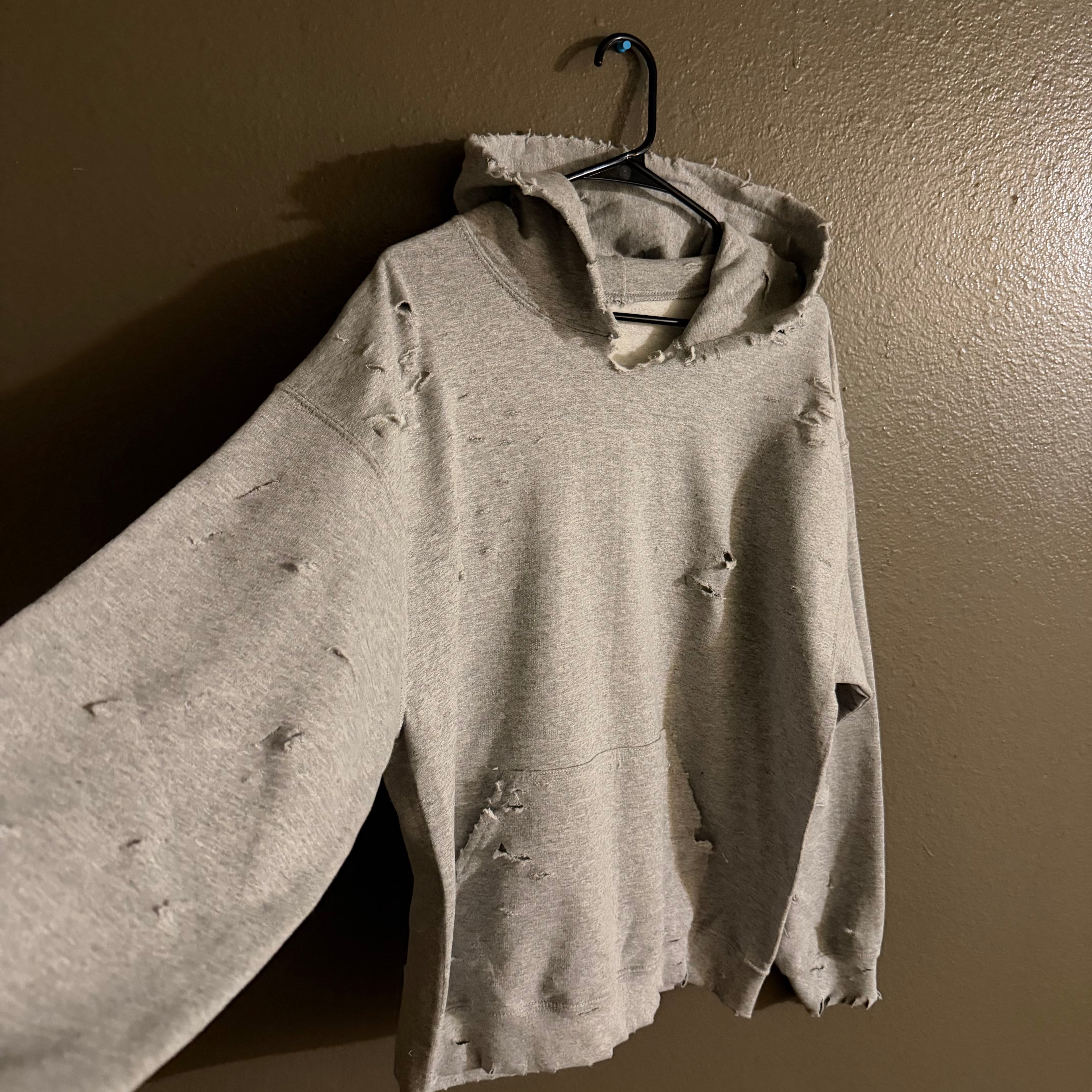 “Slashed” hoodie